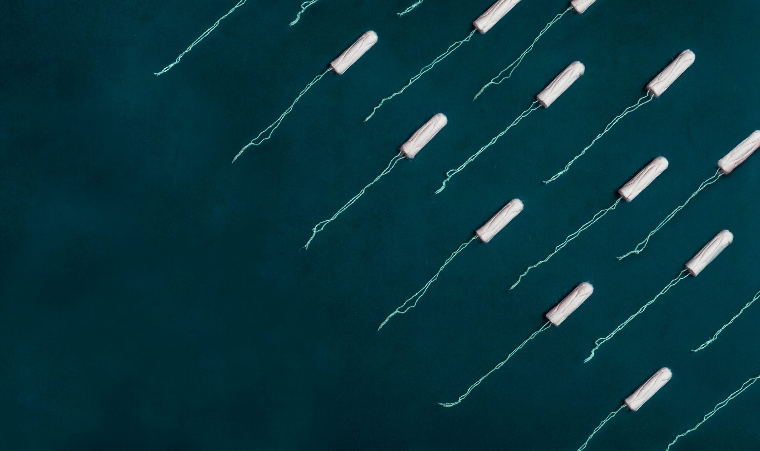 white strings on blue surface